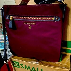 Authentic Micheal Kors cross body bag